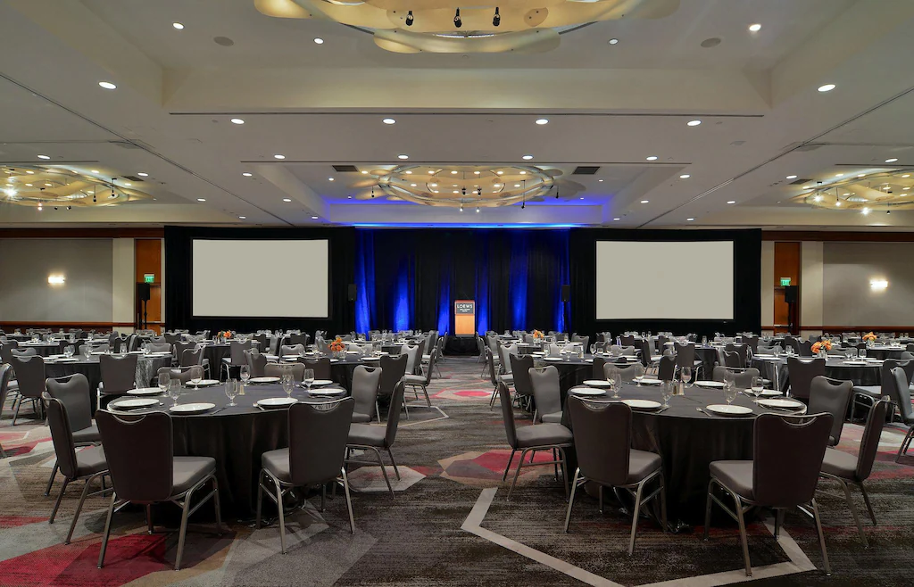 Loews Hotel - Bronson Hospitality Modern meeting room at Loews Hollywood Hotel, designed for corporate events, conferences, and professional gatherings. Featuring elegant lighting, spacious seating arrangements, and a sophisticated atmosphere, this venue provides the perfect setting for productive meetings and special events.