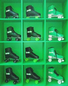 Sprite-casita-hollywood-brand-event - Bronson Hospitality Grid of green display boxes featuring Sprite-branded, high-top quad roller skates in black and green.