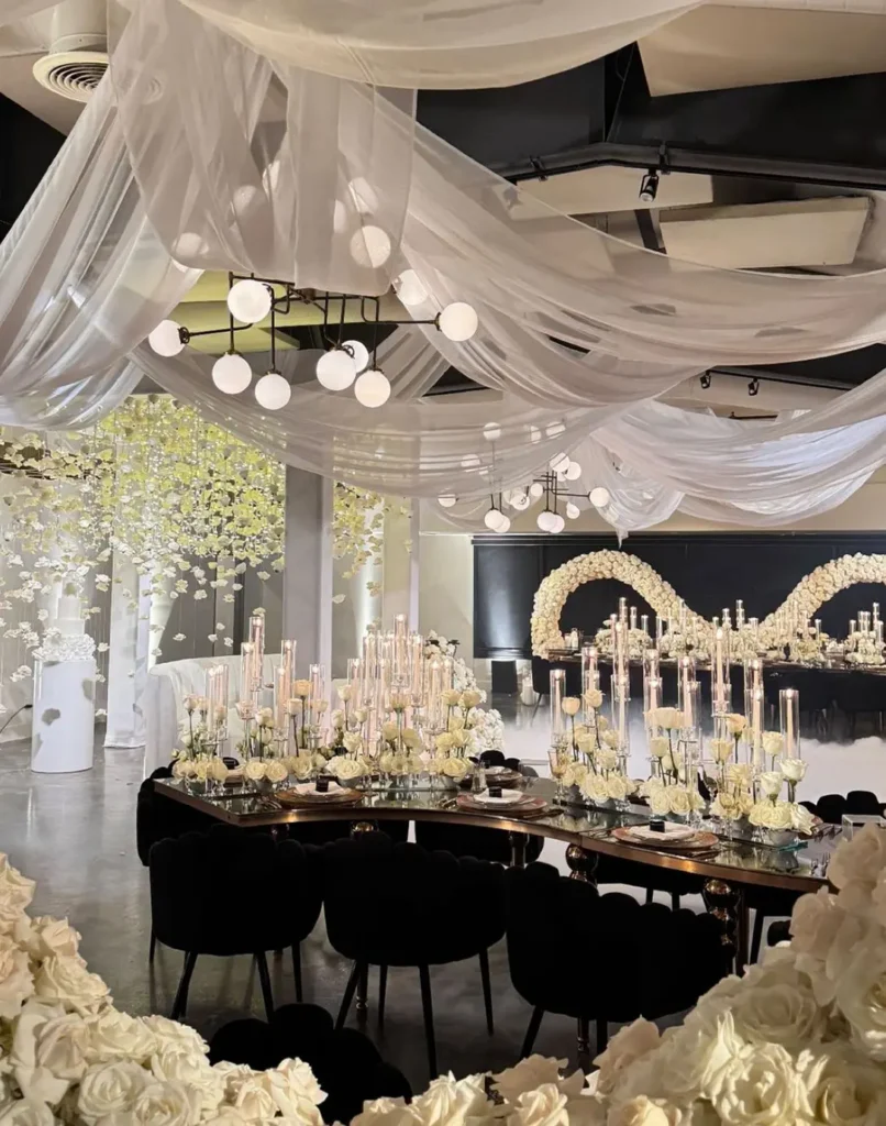 Wedding reception at Casita Hollywood with draped ceiling and white rose installations