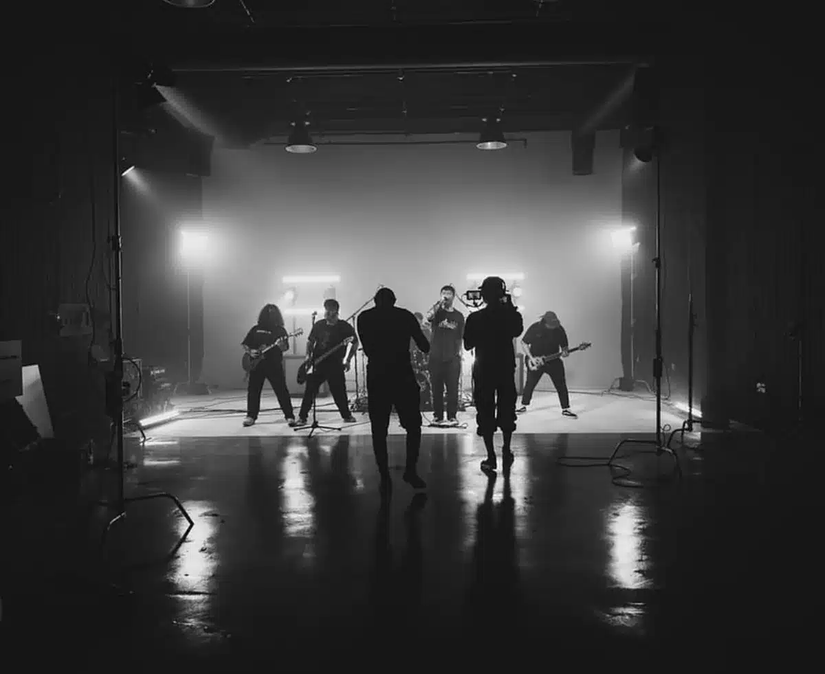 Music video shoot for Noise x Boundaries with a band performing under studio lights and fog at Studio Eleven43, a Los Angeles soundstage and production studio